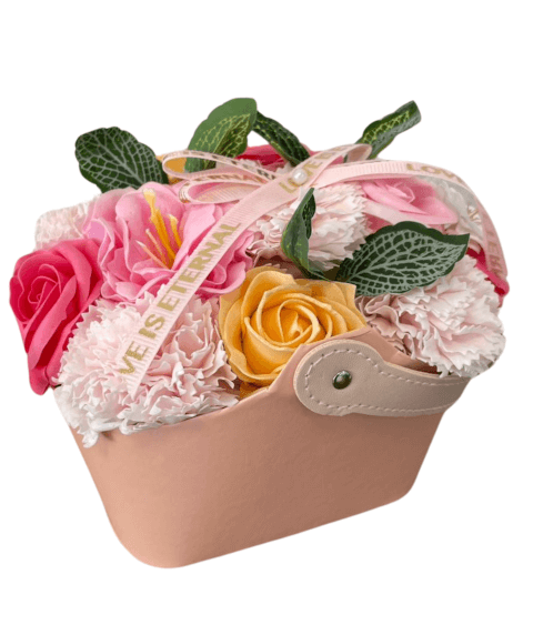Panier de fleurs artificielles avec message "L’AMOUR EST ÉTERNEL"