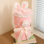 Vignette 1 Bouquet de lapin en peluche avec fleur rose